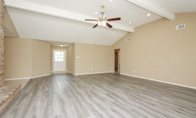 unfurnished living room with lofted ceiling with beams, ceiling fan, and light hardwood / wood-style floors