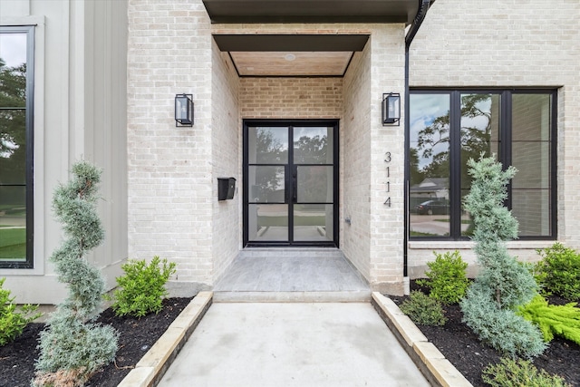 entrance to property featuring french doors