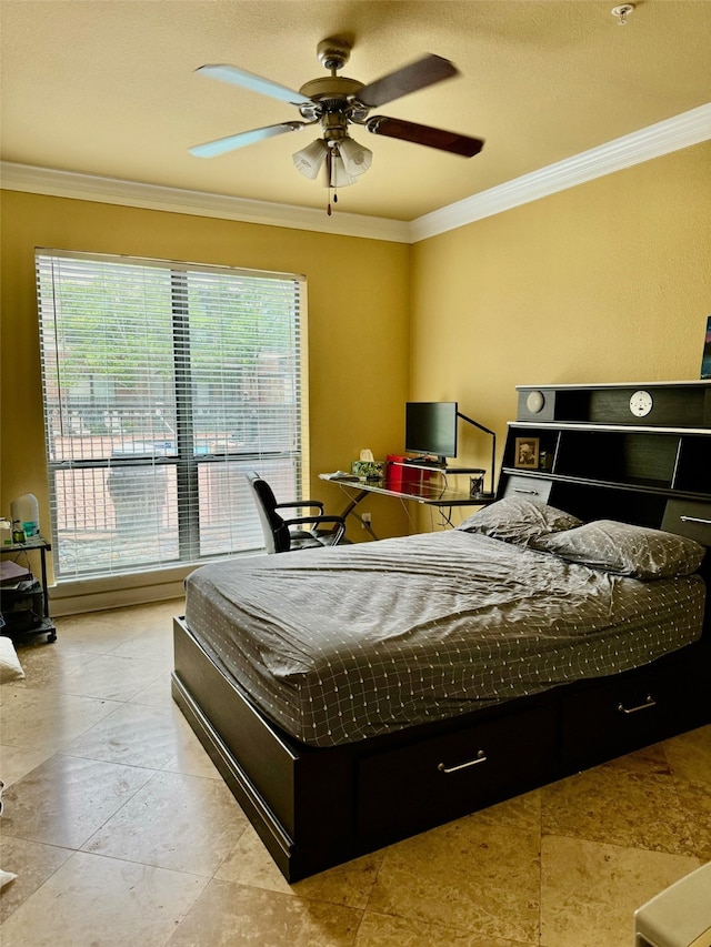 bedroom with ceiling fan and ornamental molding