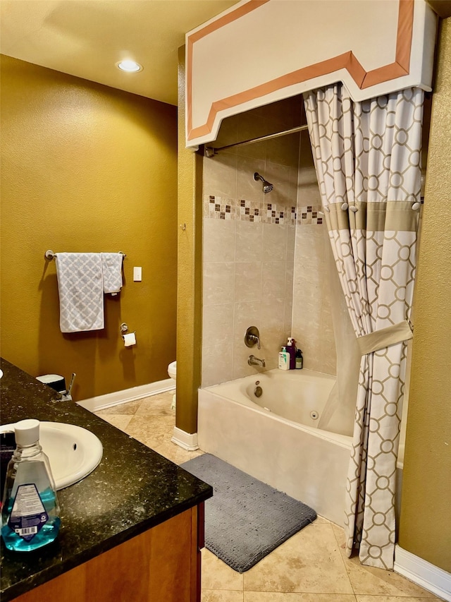 full bathroom featuring vanity, shower / tub combo with curtain, toilet, and tile patterned floors