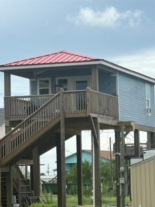 back of property with a deck