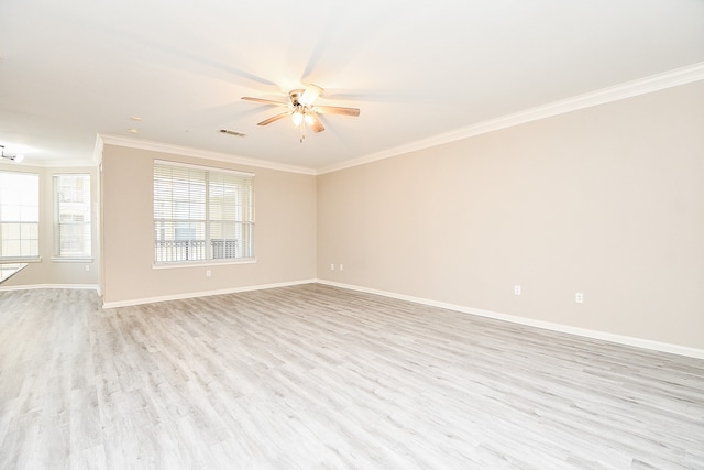 empty room with ceiling fan, ornamental molding, and light hardwood / wood-style floors