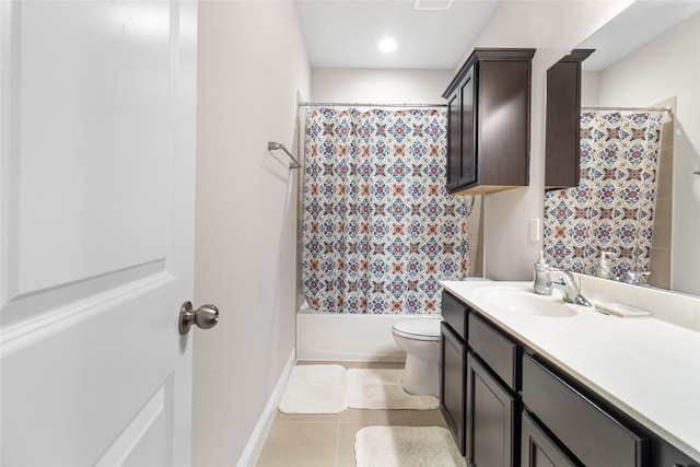 full bathroom featuring toilet, shower / bath combo with shower curtain, vanity, and tile patterned flooring