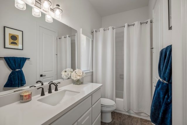 full bathroom with vanity, shower / bath combo with shower curtain, toilet, and tile patterned flooring