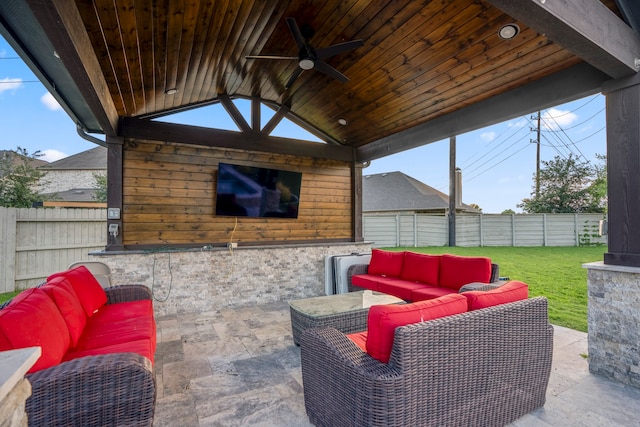 view of patio with an outdoor hangout area and ceiling fan