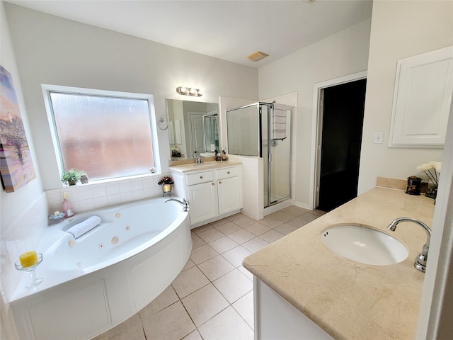 bathroom featuring vanity, separate shower and tub, and tile patterned floors