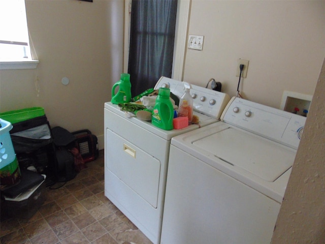 laundry area featuring laundry area and washer and clothes dryer