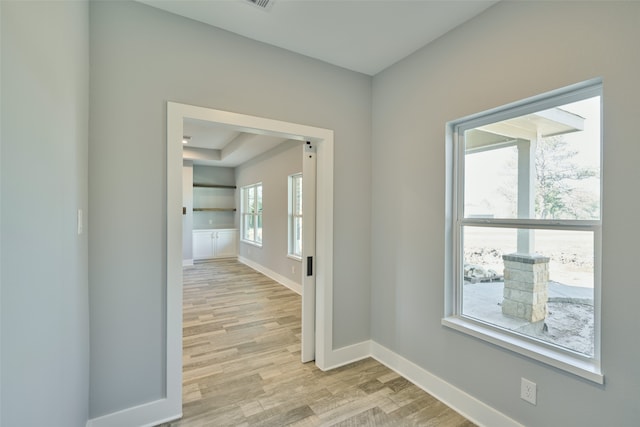 corridor featuring light hardwood / wood-style flooring