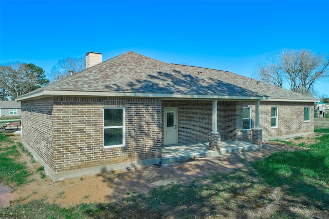 rear view of property with a patio area