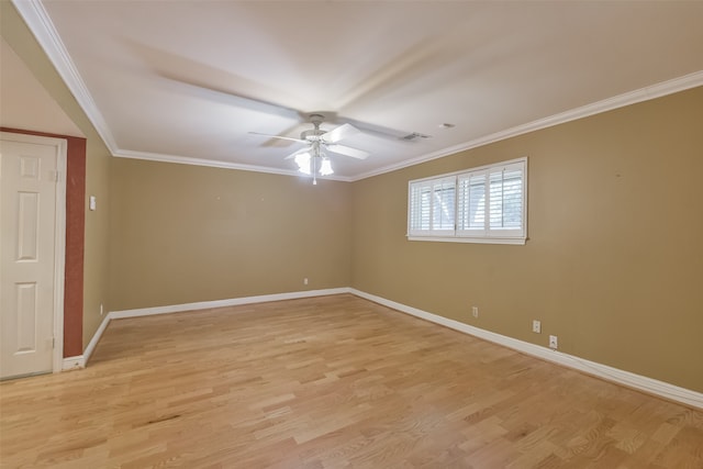 spare room with light hardwood / wood-style floors, crown molding, and ceiling fan