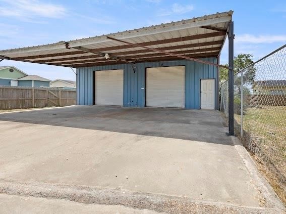 garage featuring a carport