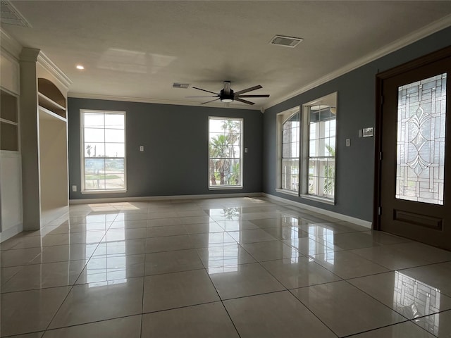 interior space featuring tile patterned floors, crown molding, and ceiling fan