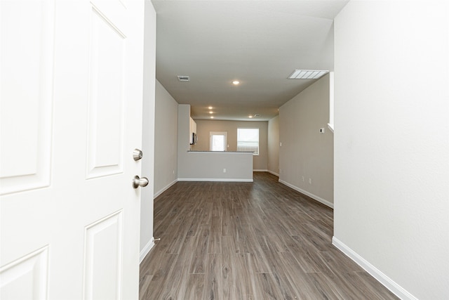 spare room with hardwood / wood-style floors