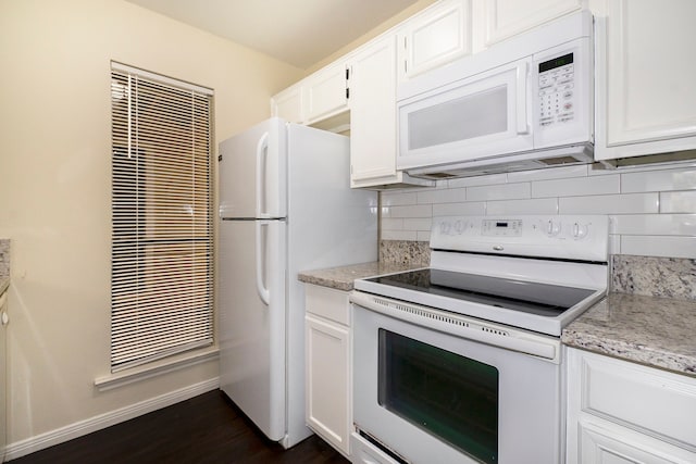 kitchen with decorative backsplash, white cabinetry, dark wood-type flooring, and white appliances