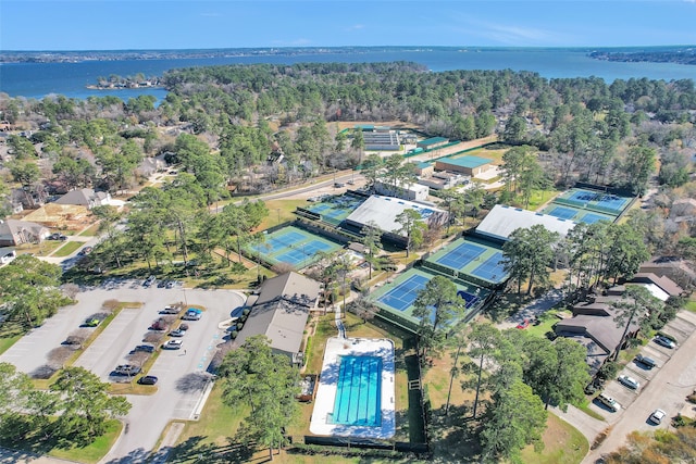 birds eye view of property with a water view