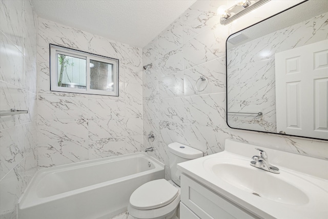 full bathroom featuring a textured ceiling, vanity, tile walls, toilet, and tiled shower / bath combo