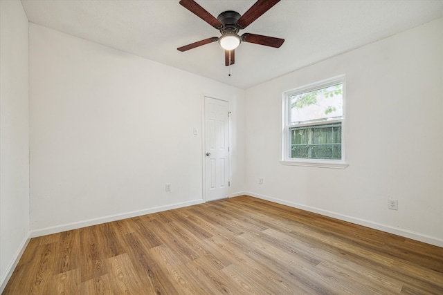 spare room with ceiling fan and light hardwood / wood-style floors