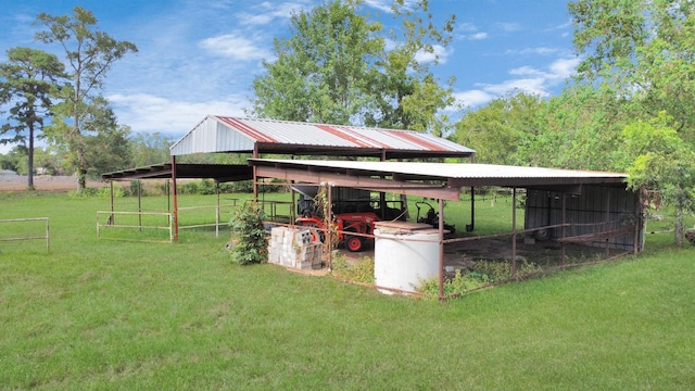 10510 Crosby Lynchburg Rd, Crosby, TX 77532 - view of green lawn with a detached carport and an outbuilding