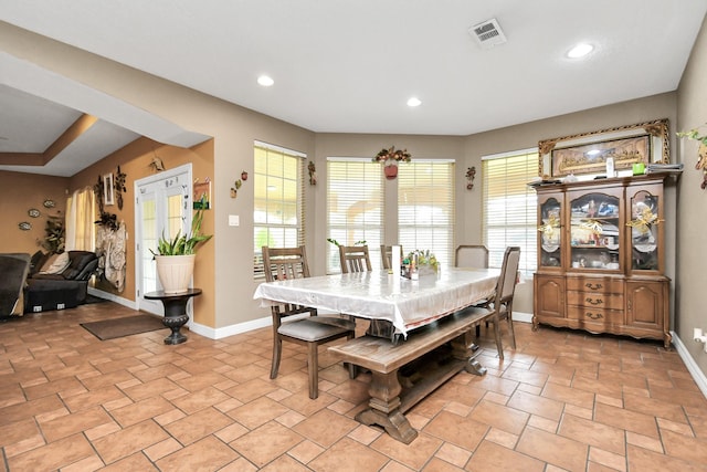 10510 Crosby Lynchburg Rd, Crosby, TX 77532 - dining space with baseboards, recessed lighting, and light stone finish floors