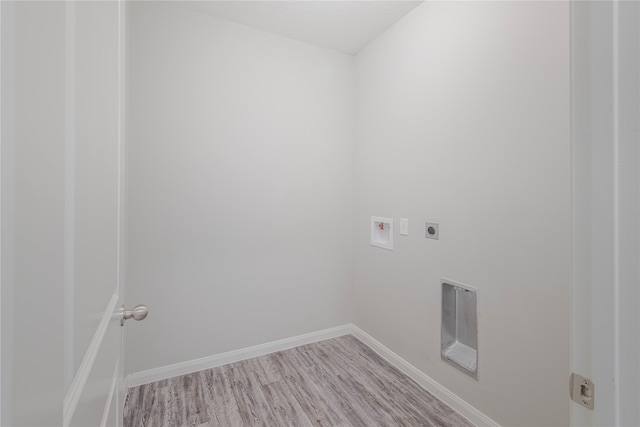 laundry area featuring light hardwood / wood-style flooring, electric dryer hookup, and washer hookup