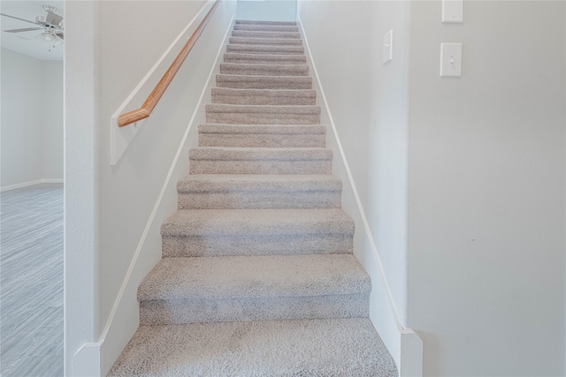 staircase with ceiling fan