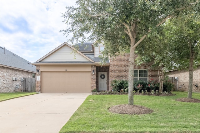 view of front of home with a front lawn and a garage