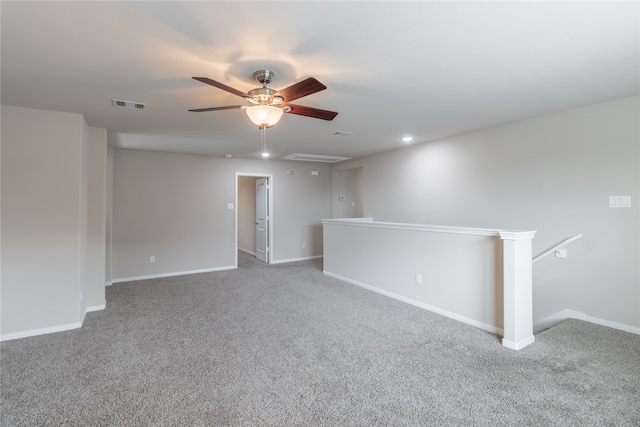 carpeted empty room with ceiling fan