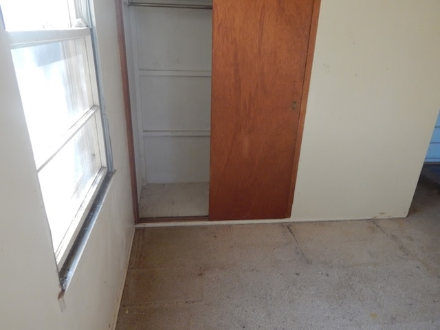 unfurnished bedroom featuring a closet