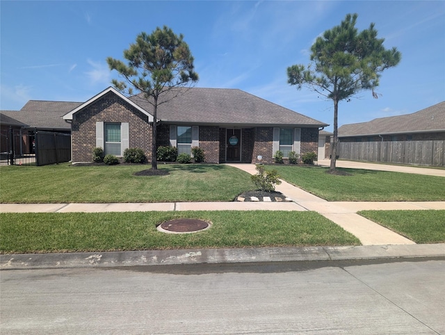 ranch-style home with a front yard