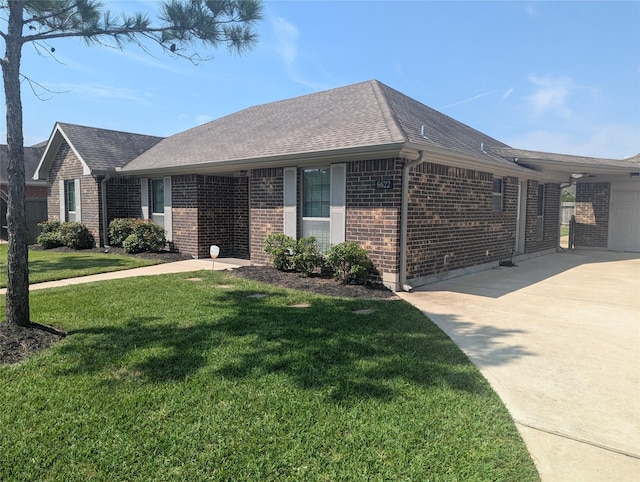 ranch-style home with a carport and a front lawn