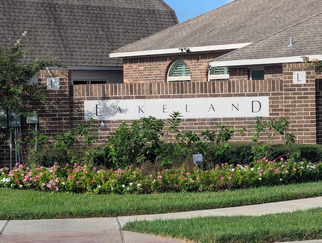 view of community sign