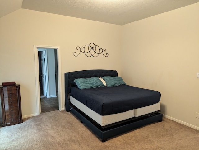 bedroom with light carpet and lofted ceiling