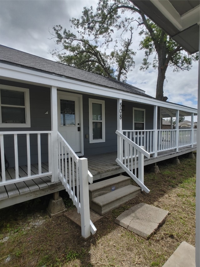 property entrance with a porch