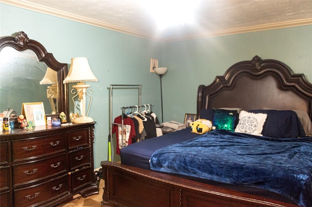 bedroom with crown molding