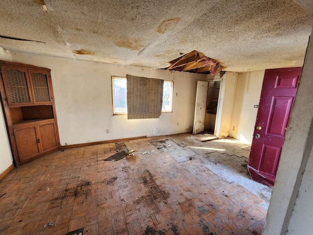 interior space featuring a textured ceiling