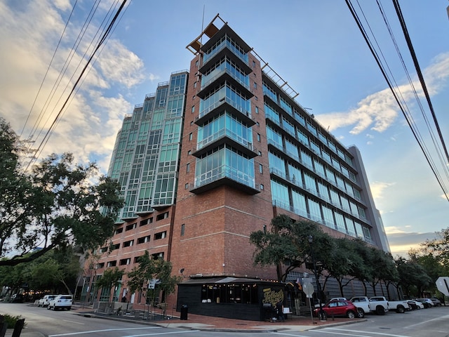 view of outdoor building at dusk