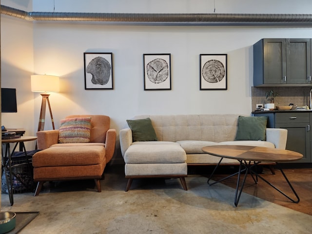 living room with concrete floors