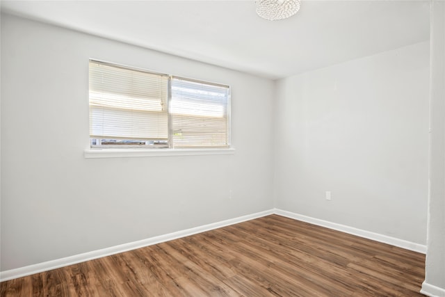 empty room featuring hardwood / wood-style flooring