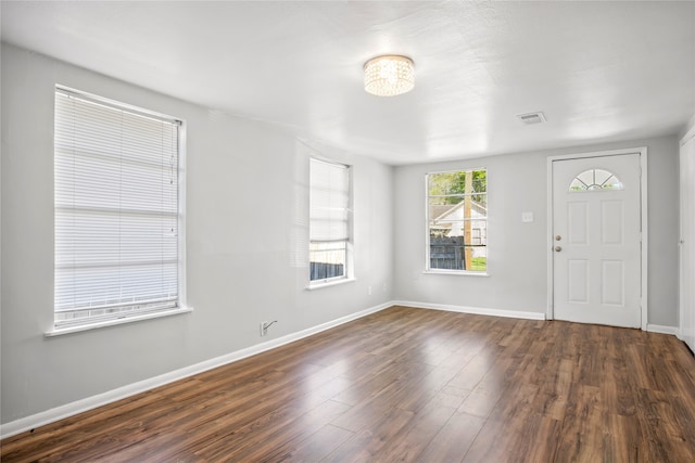 entrance foyer with dark hardwood / wood-style flooring