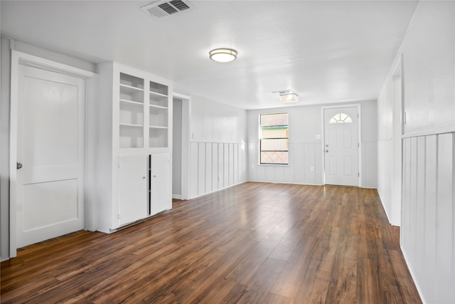 interior space with dark wood-type flooring