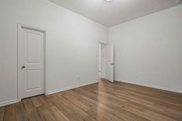 spare room with light hardwood / wood-style floors