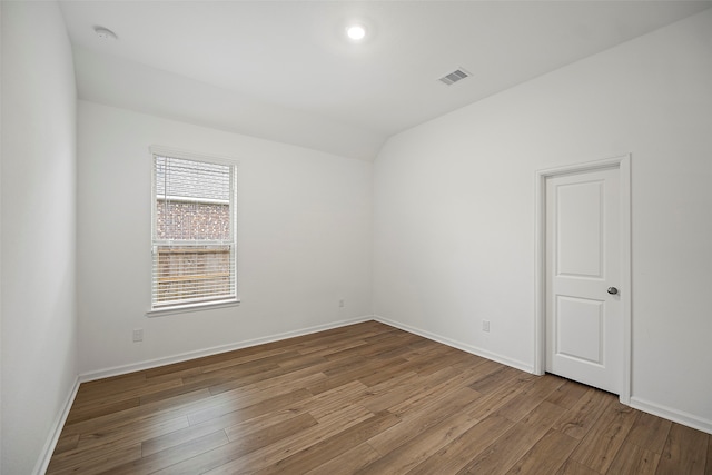 empty room with wood-type flooring