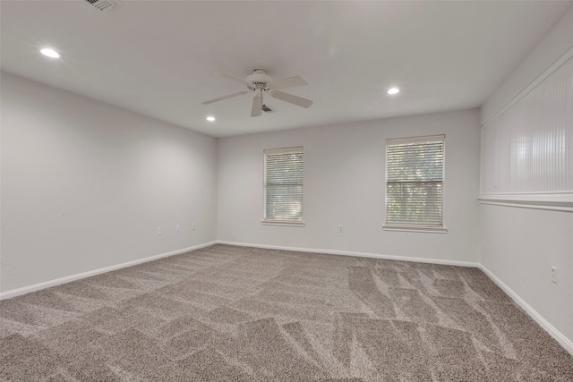 carpeted empty room with ceiling fan