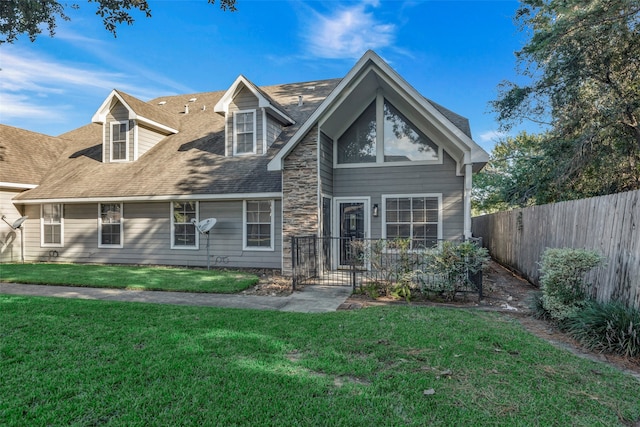 view of front of house with a front lawn