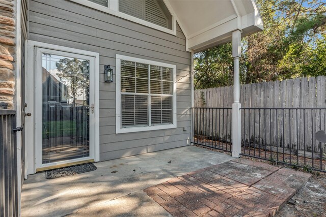 770 Hunt Rd Unit 212, Baytown, TX 77521 - view of patio / terrace with fence