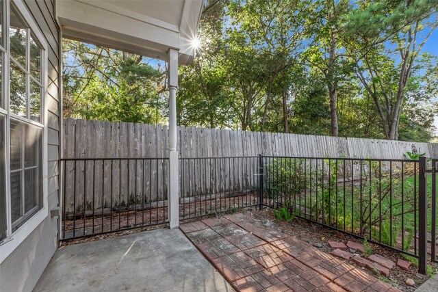 770 Hunt Rd Unit 212, Baytown, TX 77521 - view of patio with a fenced backyard