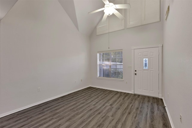 770 Hunt Rd Unit 212, Baytown, TX 77521 - entrance foyer featuring dark wood-style floors, baseboards, ceiling fan, and high vaulted ceiling