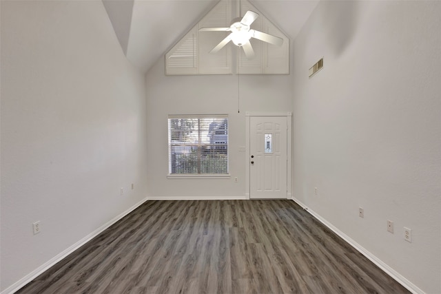 entrance foyer featuring ceiling fan, dark hardwood / wood-style floors, and high vaulted ceiling