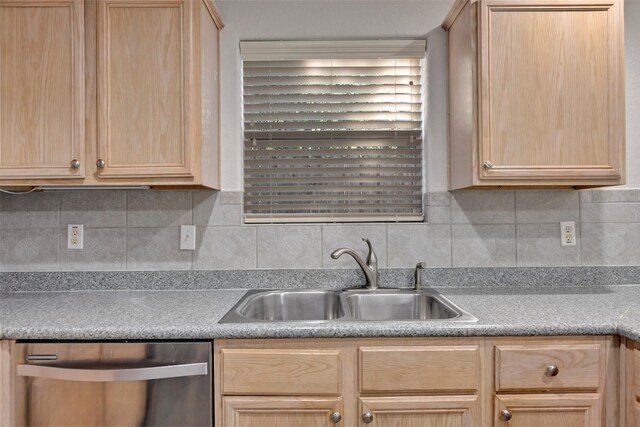 770 Hunt Rd Unit 212, Baytown, TX 77521 - kitchen with light brown cabinetry, tasteful backsplash, stainless steel dishwasher, and a sink
