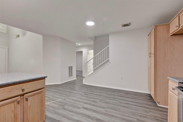 770 Hunt Rd Unit 212, Baytown, TX 77521 - kitchen featuring visible vents, recessed lighting, baseboards, and light wood-style floors